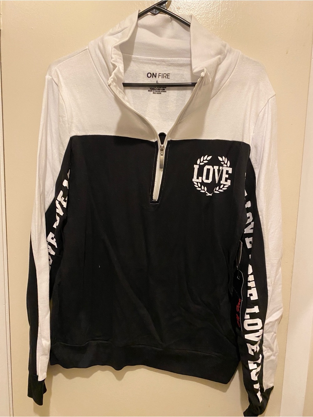 C) On Fire Black & White Half-Zip Pullover with LOVE Print. Large